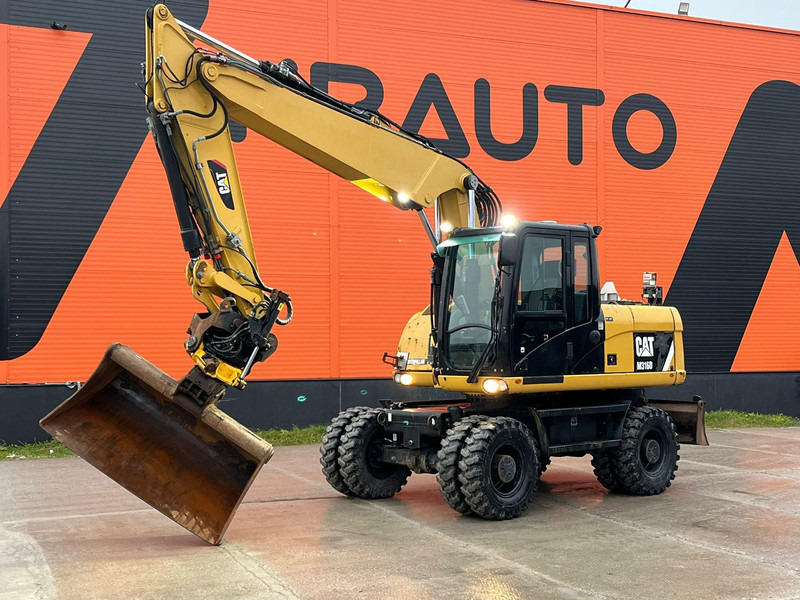 Caterpillar M316D / ROTOTILT/ AC / CENTRAL LUBRICATION / + EXTRA BUCKET - Bager na kotačima: slika Caterpillar M316D / ROTOTILT/ AC / CENTRAL LUBRICATION / + EXTRA BUCKET - Bager na kotačima Caterpillar M316D / ROTOTILT/ AC / CENTRAL LUBRICATION / + EXTRA BUCKET - Bager na kotačima: slika Caterpillar M316D / ROTOTILT/ AC / CENTRAL LUBRICATION / + EXTRA BUCKET - Bager na kotačima