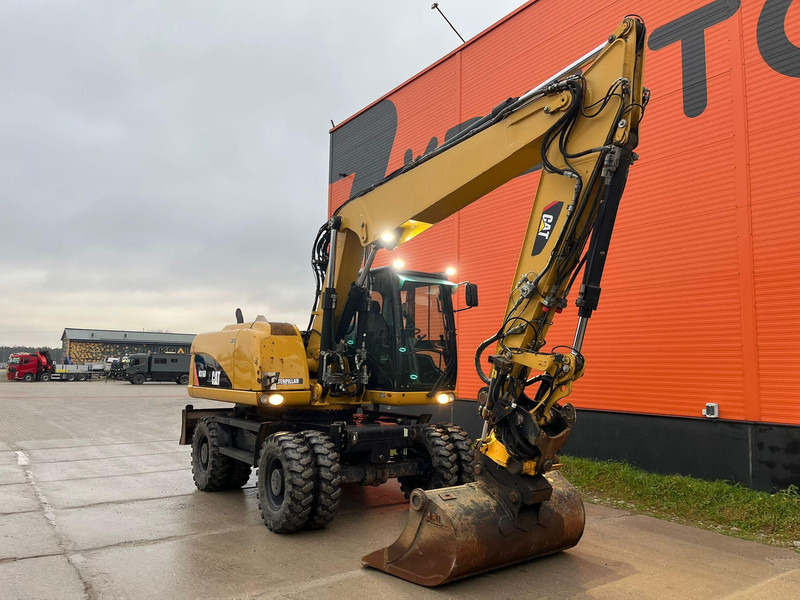 Caterpillar M316D / ROTOTILT/ AC / CENTRAL LUBRICATION / + EXTRA BUCKET - Bager na kotačima: slika Caterpillar M316D / ROTOTILT/ AC / CENTRAL LUBRICATION / + EXTRA BUCKET - Bager na kotačima Caterpillar M316D / ROTOTILT/ AC / CENTRAL LUBRICATION / + EXTRA BUCKET - Bager na kotačima: slika Caterpillar M316D / ROTOTILT/ AC / CENTRAL LUBRICATION / + EXTRA BUCKET - Bager na kotačima