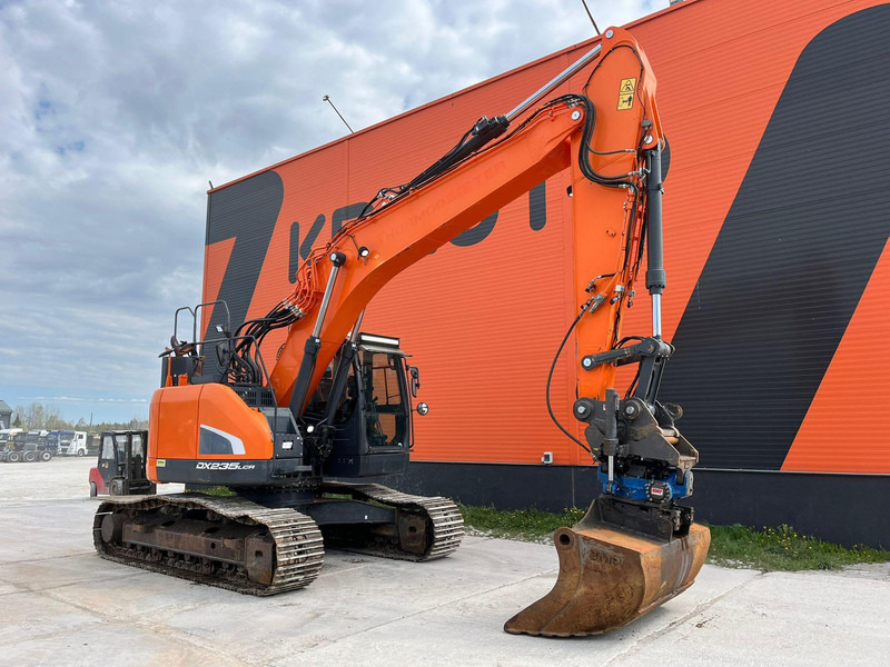 Doosan DX 235 LCR-5 3 D / ROTOTILT / CENTRAL LUBRICATION / AC - Bager gusjeničar: slika Doosan DX 235 LCR-5 3 D / ROTOTILT / CENTRAL LUBRICATION / AC - Bager gusjeničar Doosan DX 235 LCR-5 3 D / ROTOTILT / CENTRAL LUBRICATION / AC - Bager gusjeničar: slika Doosan DX 235 LCR-5 3 D / ROTOTILT / CENTRAL LUBRICATION / AC - Bager gusjeničar