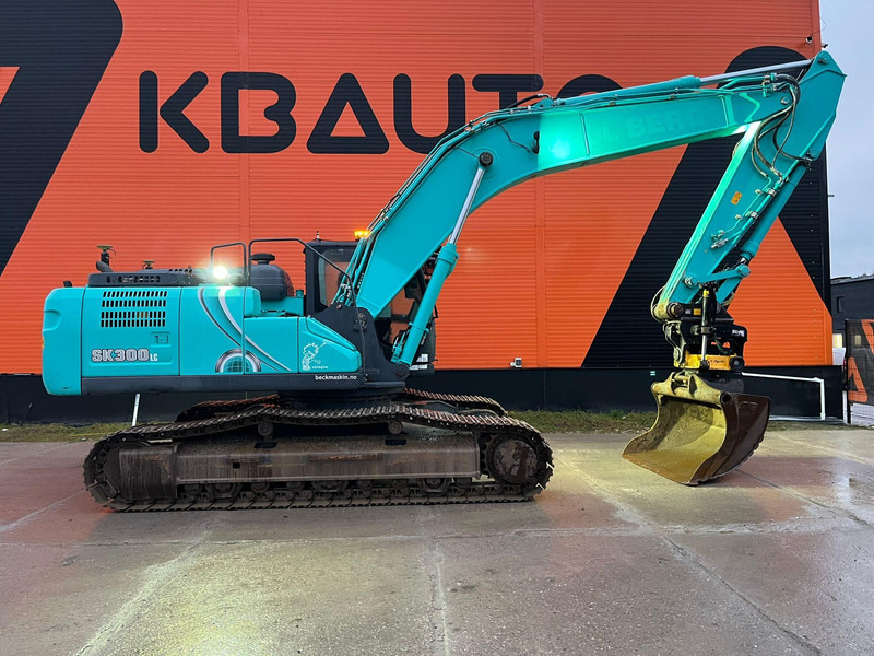 Kobelco SK 300 LC-10 3D / ROTOTILT / CENTRAL LUBRICATION / AC - Bager gusjeničar: slika Kobelco SK 300 LC-10 3D / ROTOTILT / CENTRAL LUBRICATION / AC - Bager gusjeničar Kobelco SK 300 LC-10 3D / ROTOTILT / CENTRAL LUBRICATION / AC - Bager gusjeničar: slika Kobelco SK 300 LC-10 3D / ROTOTILT / CENTRAL LUBRICATION / AC - Bager gusjeničar