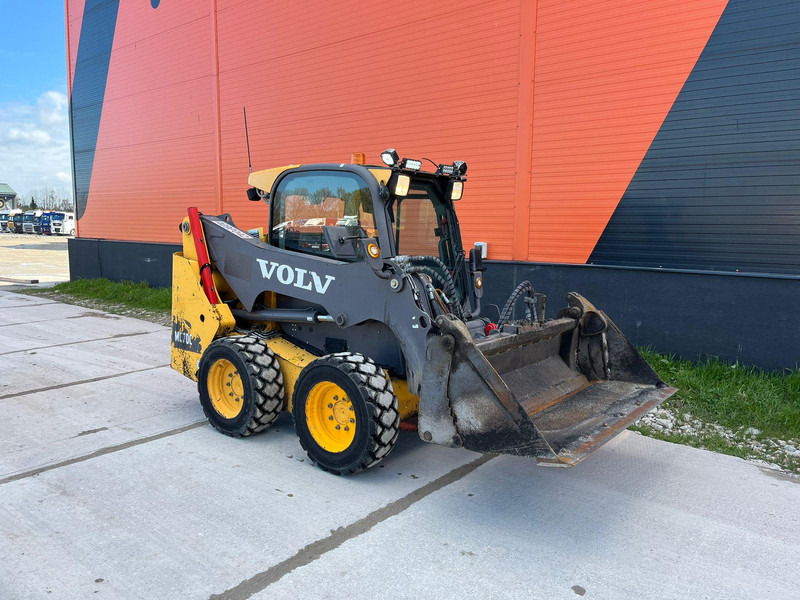 Volvo MC 70 C - Utovarivač na kotačima: slika Volvo MC 70 C - Utovarivač na kotačima Volvo MC 70 C - Utovarivač na kotačima: slika Volvo MC 70 C - Utovarivač na kotačima