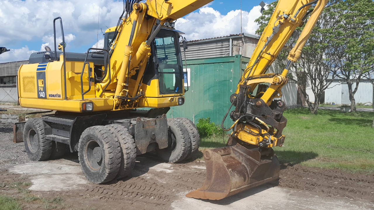 KOMATSU PW 140-7 - Bager na kotačima: slika KOMATSU PW 140-7 - Bager na kotačima KOMATSU PW 140-7 - Bager na kotačima: slika KOMATSU PW 140-7 - Bager na kotačima