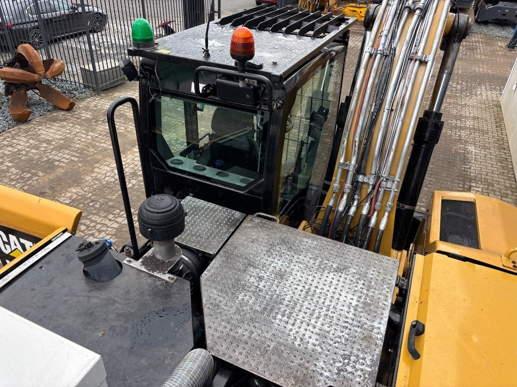 Bager na kotačima CAT CAT M 322 F - M322 - M 320 - M 318: slika Bager na kotačima CAT CAT M 322 F - M322 - M 320 - M 318