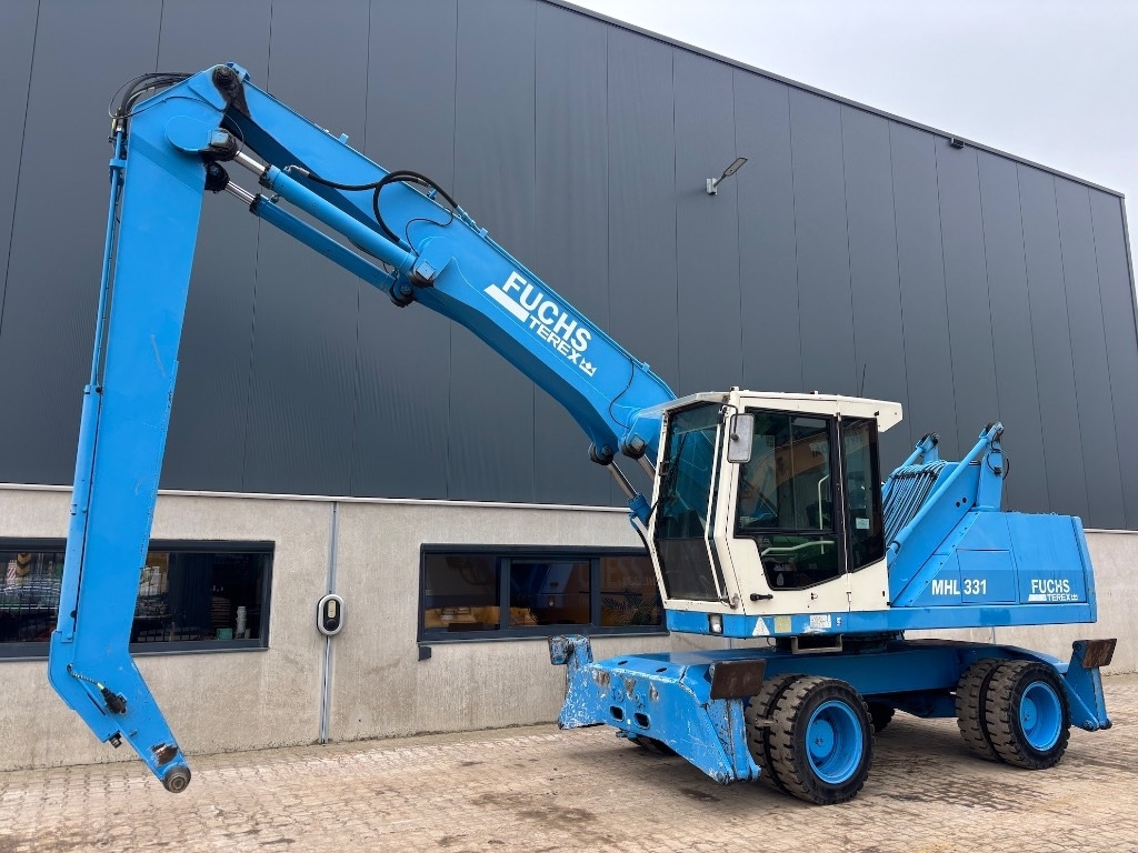 Fuchs MHL 331 C - MHL331 - MHL331C - Stroj za rukovanje otpadom: slika Fuchs MHL 331 C - MHL331 - MHL331C - Stroj za rukovanje otpadom Fuchs MHL 331 C - MHL331 - MHL331C - Stroj za rukovanje otpadom: slika Fuchs MHL 331 C - MHL331 - MHL331C - Stroj za rukovanje otpadom