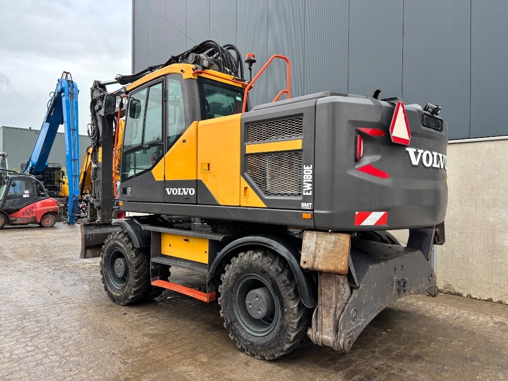 Volvo EW 180 E - EW 200 E - Bager na kotačima: slika Volvo EW 180 E - EW 200 E - Bager na kotačima Volvo EW 180 E - EW 200 E - Bager na kotačima: slika Volvo EW 180 E - EW 200 E - Bager na kotačima