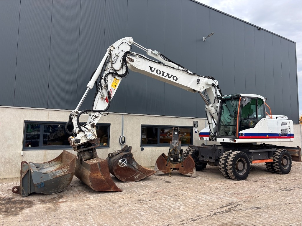 Volvo EW 210 D - EW210 - EW210D - EW 180 - EW 240 - Bager na kotačima: slika Volvo EW 210 D - EW210 - EW210D - EW 180 - EW 240 - Bager na kotačima Volvo EW 210 D - EW210 - EW210D - EW 180 - EW 240 - Bager na kotačima: slika Volvo EW 210 D - EW210 - EW210D - EW 180 - EW 240 - Bager na kotačima