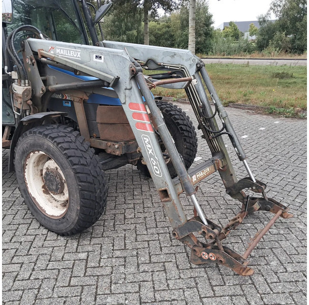 New Holland TL70 TL70 - Tegljač: slika New Holland TL70 TL70 - Tegljač New Holland TL70 TL70 - Tegljač: slika New Holland TL70 TL70 - Tegljač