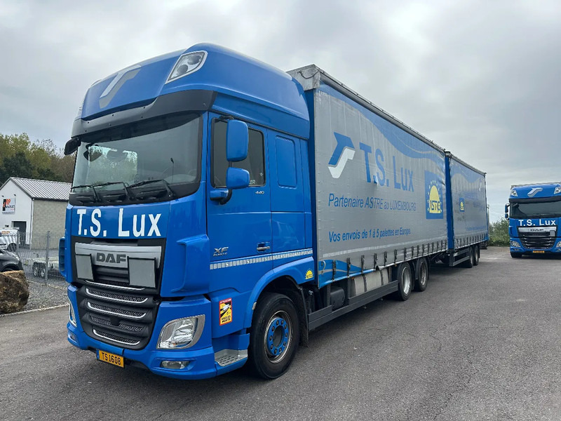 DAF XF 440 6x2 / SUPERSPACECAB / KOMBI MIT ANHANGER SCHMITZ 2016 / DURCHLADEN / 2 STUCK - Kamion s ceradom: slika DAF XF 440 6x2 / SUPERSPACECAB / KOMBI MIT ANHANGER SCHMITZ 2016 / DURCHLADEN / 2 STUCK - Kamion s ceradom DAF XF 440 6x2 / SUPERSPACECAB / KOMBI MIT ANHANGER SCHMITZ 2016 / DURCHLADEN / 2 STUCK - Kamion s ceradom: slika DAF XF 440 6x2 / SUPERSPACECAB / KOMBI MIT ANHANGER SCHMITZ 2016 / DURCHLADEN / 2 STUCK - Kamion s ceradom