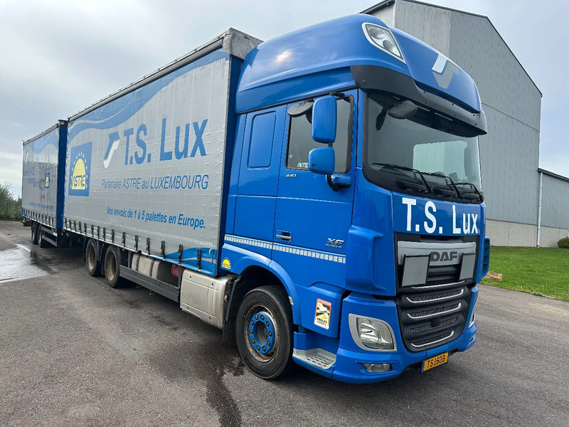 DAF XF 440 6x2 / SUPERSPACECAB / KOMBI MIT ANHANGER SCHMITZ 2016 / DURCHLADEN / 2 STUCK - Kamion s ceradom: slika DAF XF 440 6x2 / SUPERSPACECAB / KOMBI MIT ANHANGER SCHMITZ 2016 / DURCHLADEN / 2 STUCK - Kamion s ceradom DAF XF 440 6x2 / SUPERSPACECAB / KOMBI MIT ANHANGER SCHMITZ 2016 / DURCHLADEN / 2 STUCK - Kamion s ceradom: slika DAF XF 440 6x2 / SUPERSPACECAB / KOMBI MIT ANHANGER SCHMITZ 2016 / DURCHLADEN / 2 STUCK - Kamion s ceradom