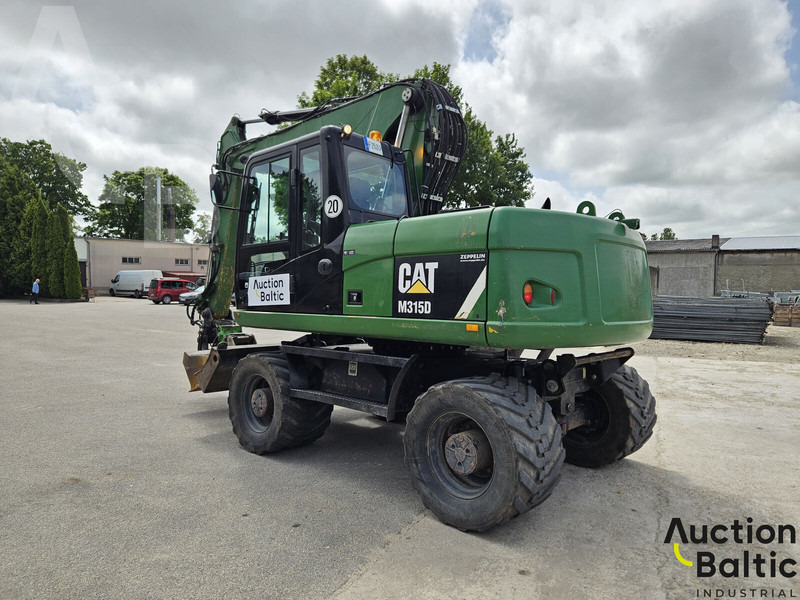 Caterpillar M315D - Bager na kotačima: slika Caterpillar M315D - Bager na kotačima Caterpillar M315D - Bager na kotačima: slika Caterpillar M315D - Bager na kotačima