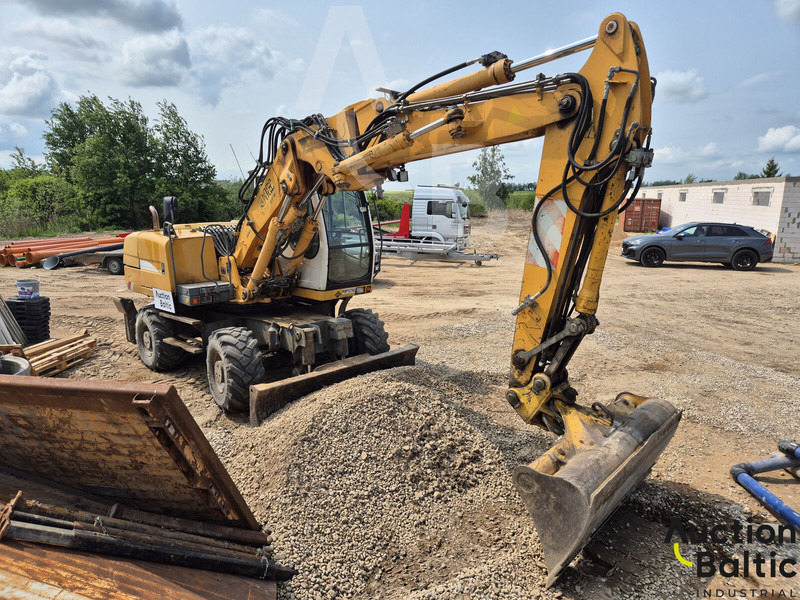 Liebherr A 316 Litronic - Bager na kotačima: slika Liebherr A 316 Litronic - Bager na kotačima Liebherr A 316 Litronic - Bager na kotačima: slika Liebherr A 316 Litronic - Bager na kotačima