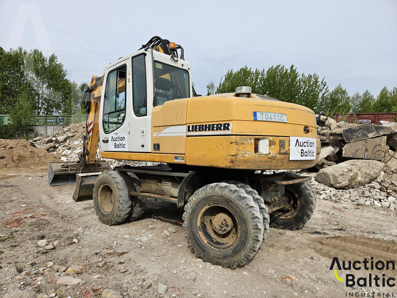 Liebherr A 316 Litronic - Bager na kotačima: slika Liebherr A 316 Litronic - Bager na kotačima Liebherr A 316 Litronic - Bager na kotačima: slika Liebherr A 316 Litronic - Bager na kotačima