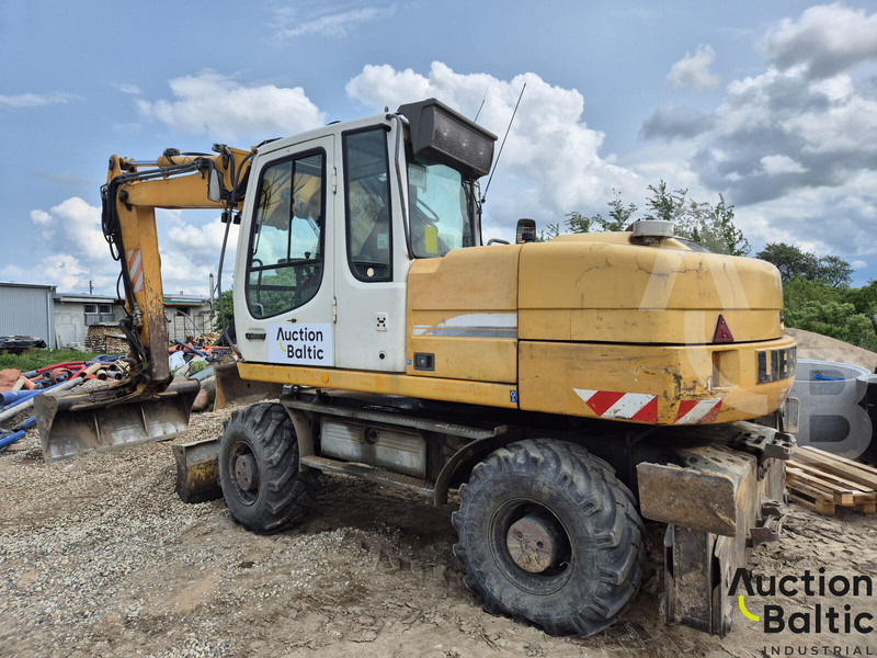 Liebherr A 316 Litronic - Bager na kotačima: slika Liebherr A 316 Litronic - Bager na kotačima Liebherr A 316 Litronic - Bager na kotačima: slika Liebherr A 316 Litronic - Bager na kotačima