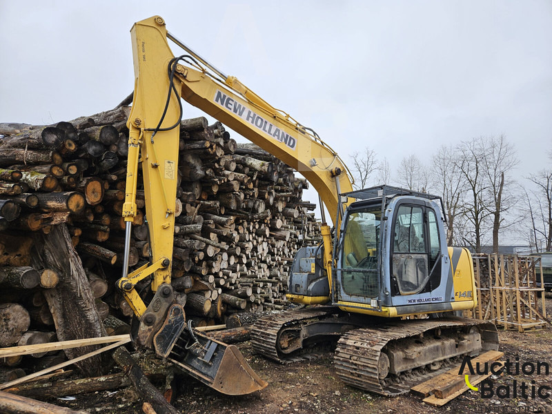 New Holland E 145 - Bager gusjeničar: slika New Holland E 145 - Bager gusjeničar New Holland E 145 - Bager gusjeničar: slika New Holland E 145 - Bager gusjeničar