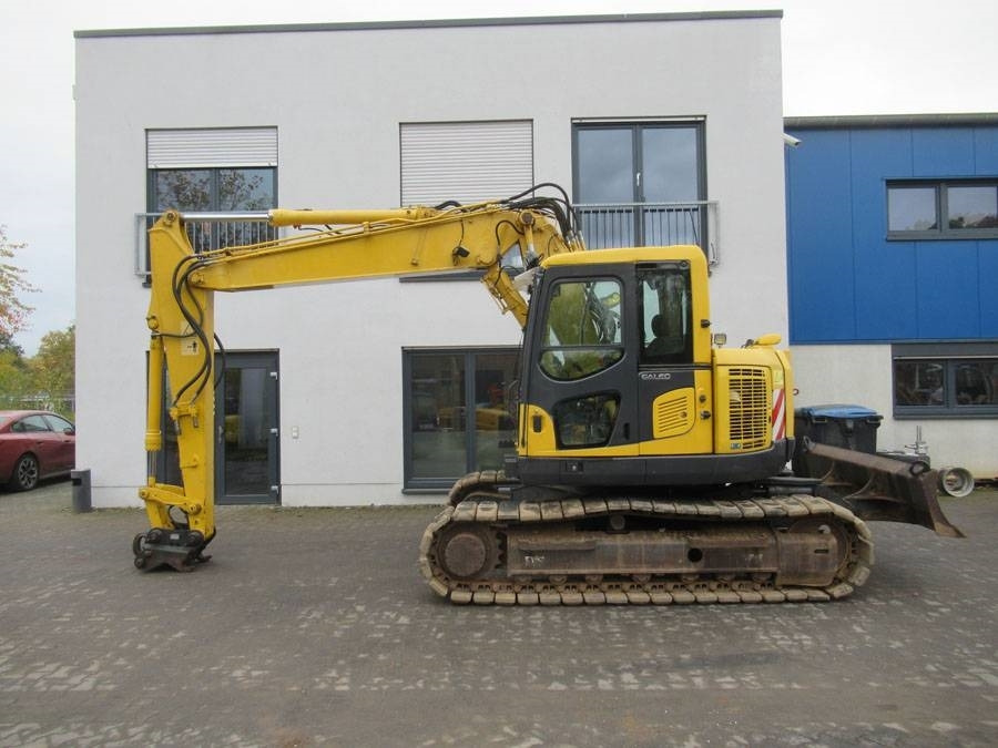 Komatsu PC138 US-8 - Bager gusjeničar: slika Komatsu PC138 US-8 - Bager gusjeničar Komatsu PC138 US-8 - Bager gusjeničar: slika Komatsu PC138 US-8 - Bager gusjeničar