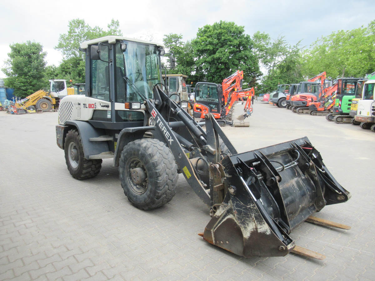 Terex TL80 - Utovarivač na kotačima: slika Terex TL80 - Utovarivač na kotačima Terex TL80 - Utovarivač na kotačima: slika Terex TL80 - Utovarivač na kotačima