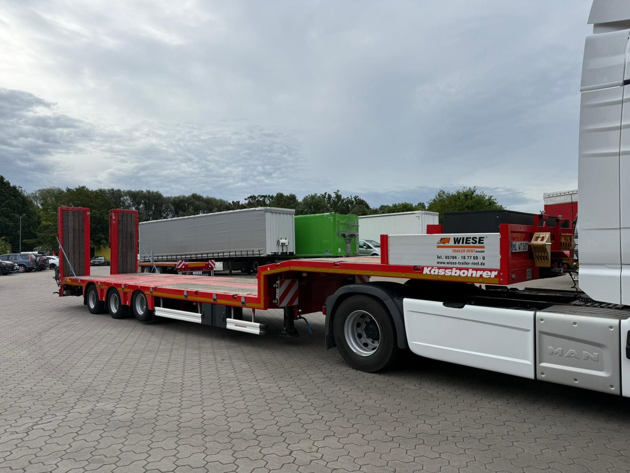 Kässbohrer K.SLS ECO Tieflader mit hydraulischen Rampen - Poluprikolica s niskim utovarivačem: slika Kässbohrer K.SLS ECO Tieflader mit hydraulischen Rampen - Poluprikolica s niskim utovarivačem Kässbohrer K.SLS ECO Tieflader mit hydraulischen Rampen - Poluprikolica s niskim utovarivačem: slika Kässbohrer K.SLS ECO Tieflader mit hydraulischen Rampen - Poluprikolica s niskim utovarivačem