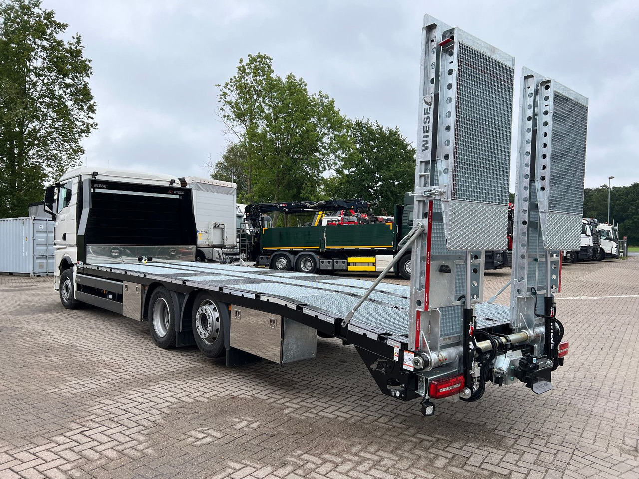 MAN Baumaschinen- Arbeitsbühnentransporter Rampen - Kamion za vuču: slika MAN Baumaschinen- Arbeitsbühnentransporter Rampen - Kamion za vuču MAN Baumaschinen- Arbeitsbühnentransporter Rampen - Kamion za vuču: slika MAN Baumaschinen- Arbeitsbühnentransporter Rampen - Kamion za vuču