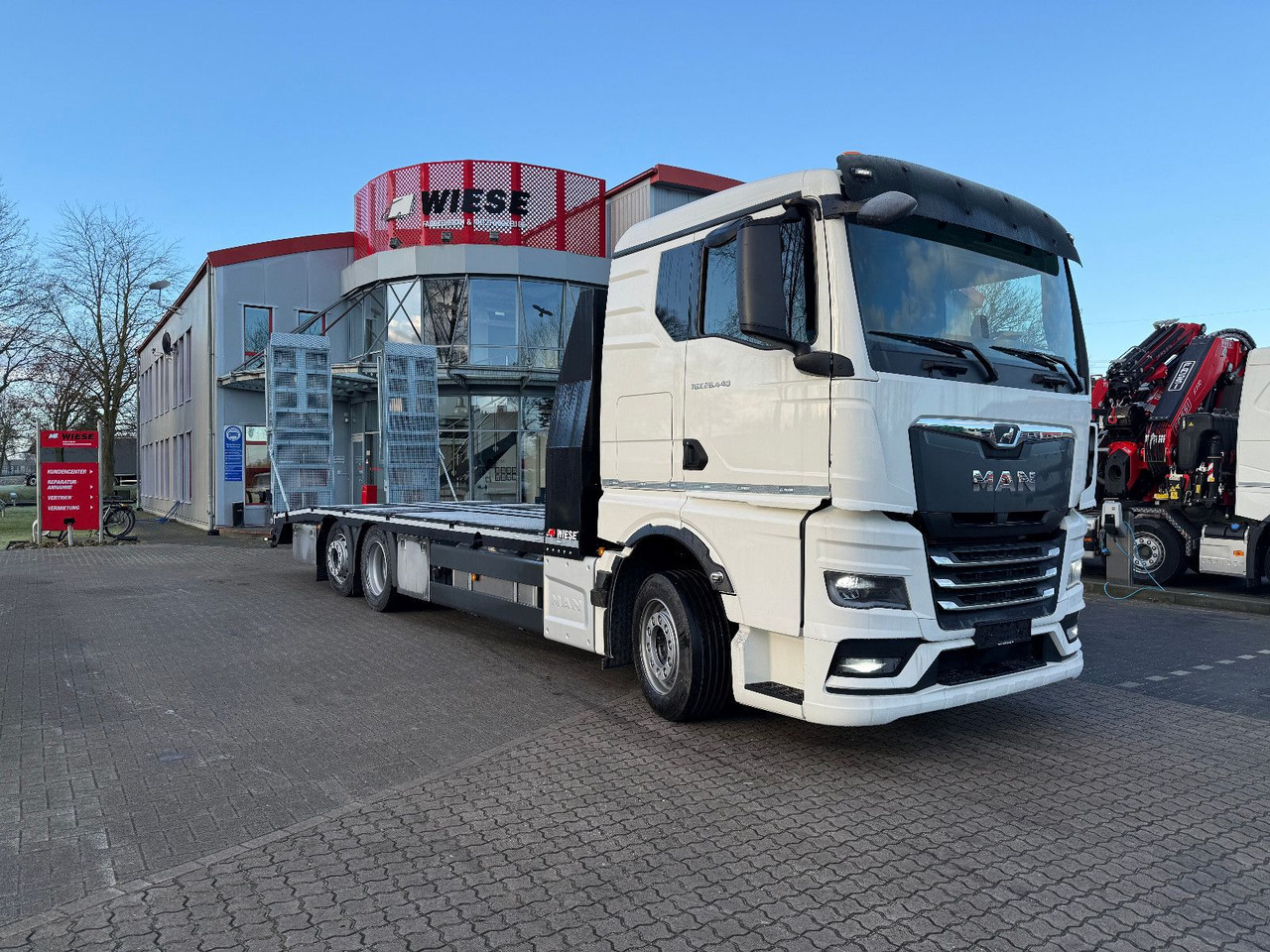 MAN Baumaschinen- Arbeitsbühnentransporter Rampen - Autotransporter: slika MAN Baumaschinen- Arbeitsbühnentransporter Rampen - Autotransporter MAN Baumaschinen- Arbeitsbühnentransporter Rampen - Autotransporter: slika MAN Baumaschinen- Arbeitsbühnentransporter Rampen - Autotransporter