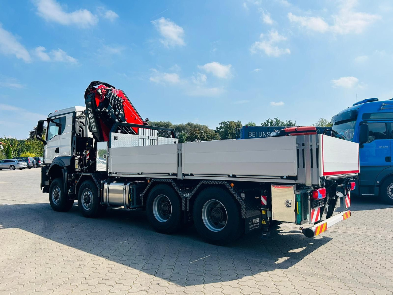 Kamion s kranom MAN TGS 41.520 8x8 mit Fassi Ladekran F710RA.2.26: slika Kamion s kranom MAN TGS 41.520 8x8 mit Fassi Ladekran F710RA.2.26