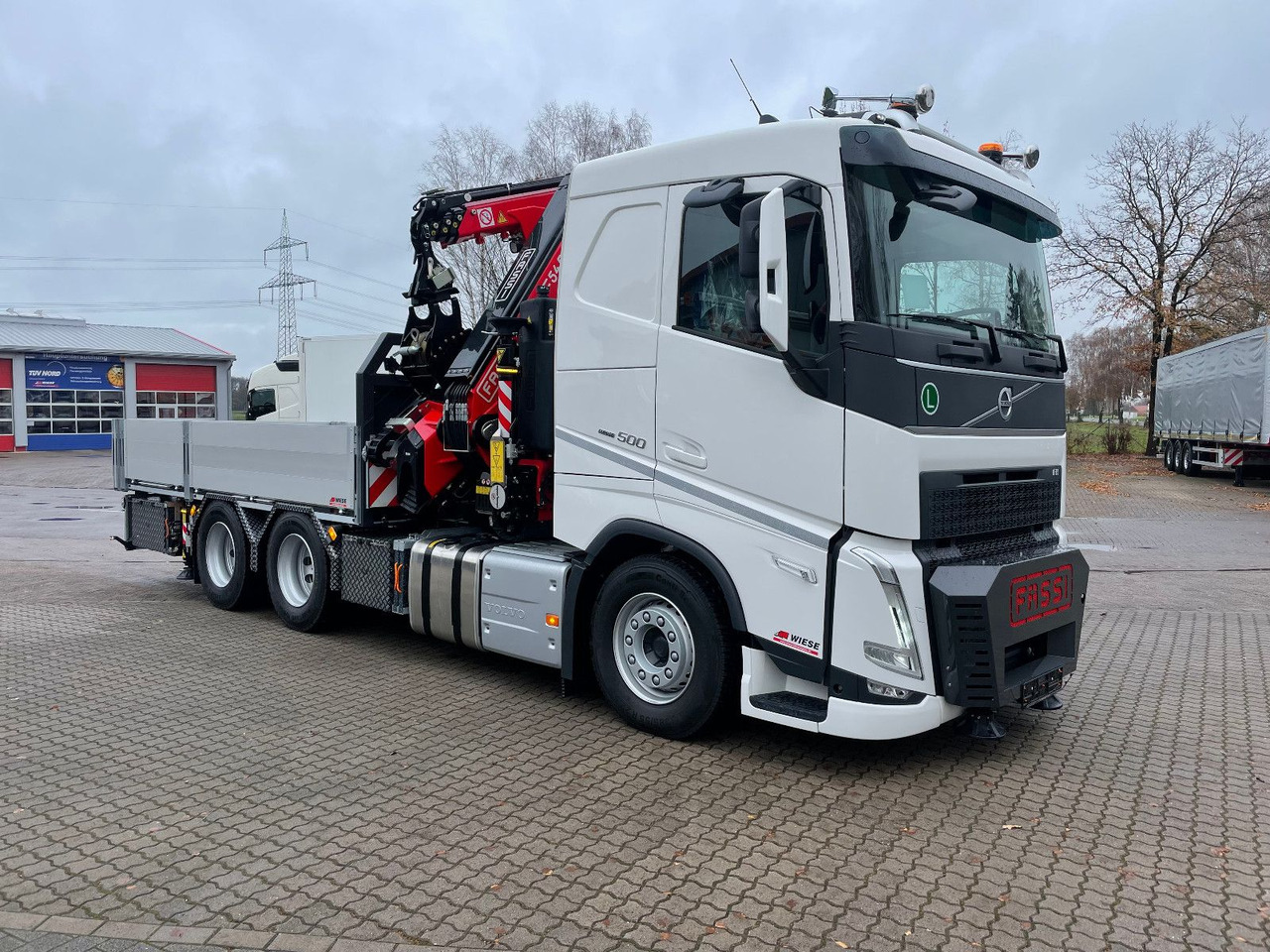 Volvo FH500 6x4 Fassi F545RA 2.27 mit Jib und Winde - Kamion s otvorenim sandukom, Kamion s kranom: slika Volvo FH500 6x4 Fassi F545RA 2.27 mit Jib und Winde - Kamion s otvorenim sandukom, Kamion s kranom Volvo FH500 6x4 Fassi F545RA 2.27 mit Jib und Winde - Kamion s otvorenim sandukom, Kamion s kranom: slika Volvo FH500 6x4 Fassi F545RA 2.27 mit Jib und Winde - Kamion s otvorenim sandukom, Kamion s kranom