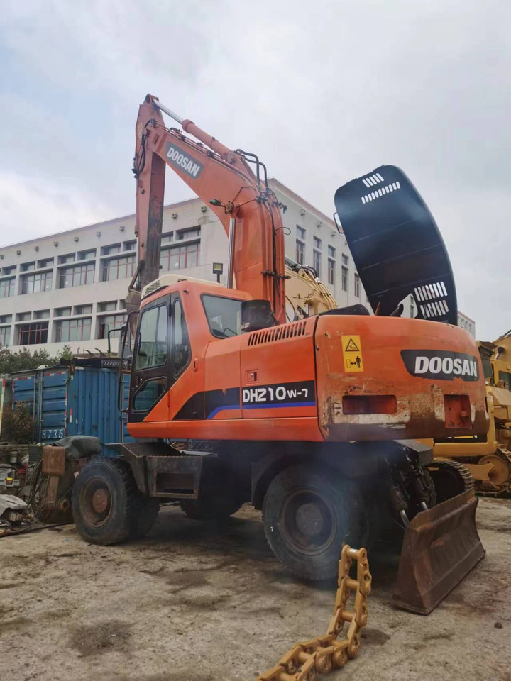 DOOSAN DH210W-7 - Bager na kotačima: slika DOOSAN DH210W-7 - Bager na kotačima DOOSAN DH210W-7 - Bager na kotačima: slika DOOSAN DH210W-7 - Bager na kotačima