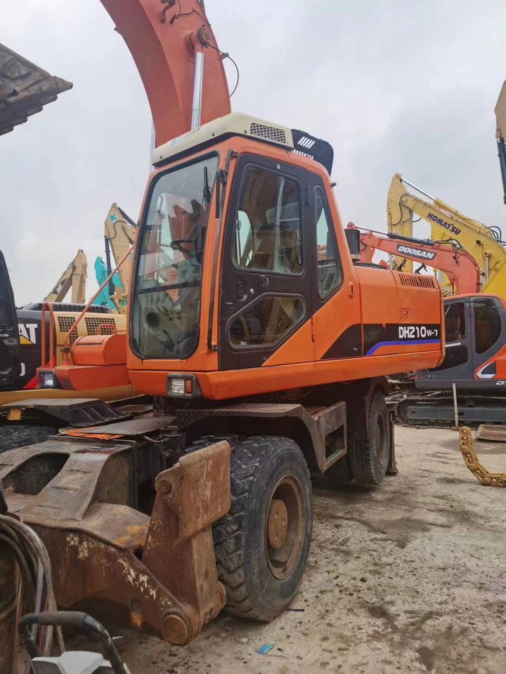 DOOSAN DH210W-7 - Bager na kotačima: slika DOOSAN DH210W-7 - Bager na kotačima DOOSAN DH210W-7 - Bager na kotačima: slika DOOSAN DH210W-7 - Bager na kotačima