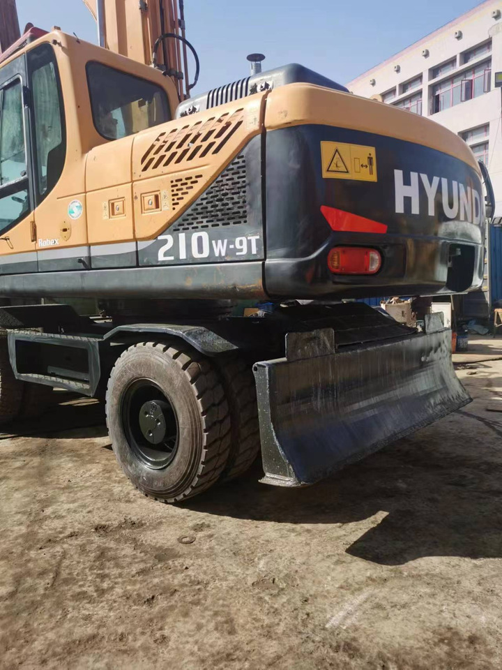 HYUNDAI 210W-9 - Bager na kotačima: slika HYUNDAI 210W-9 - Bager na kotačima HYUNDAI 210W-9 - Bager na kotačima: slika HYUNDAI 210W-9 - Bager na kotačima