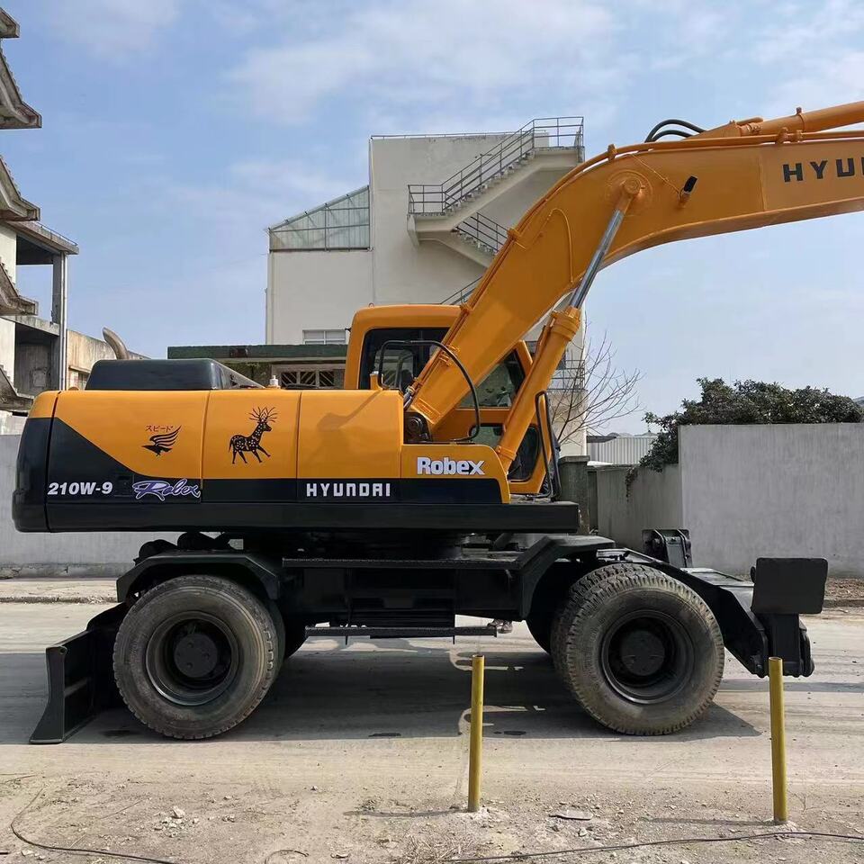 HYUNDAI 210W-9 - Bager na kotačima: slika HYUNDAI 210W-9 - Bager na kotačima HYUNDAI 210W-9 - Bager na kotačima: slika HYUNDAI 210W-9 - Bager na kotačima