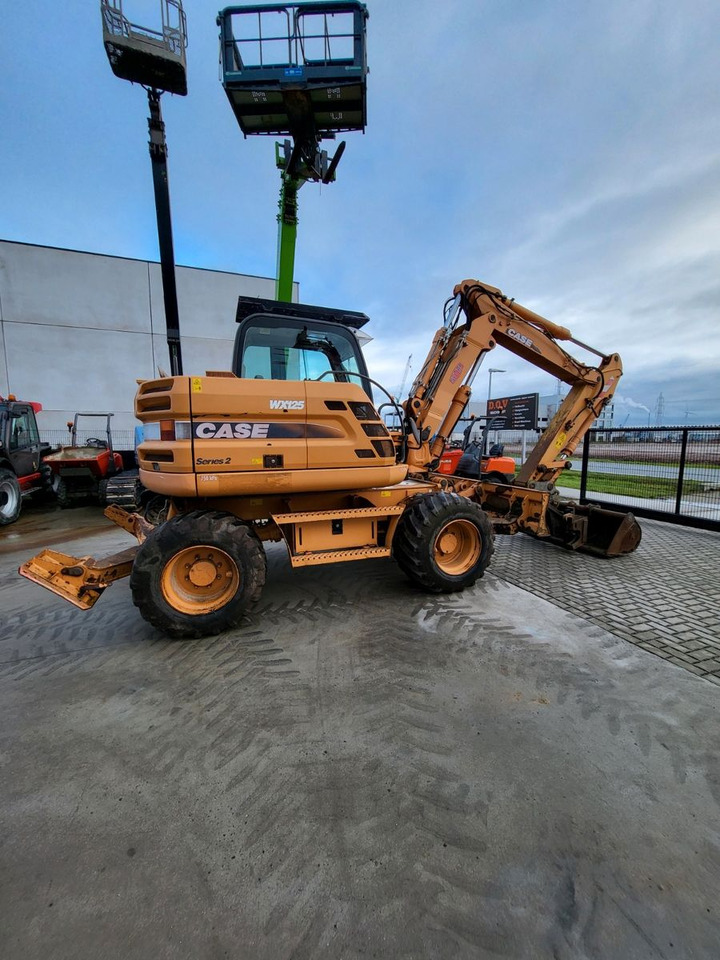 Case WX125 - Bager na kotačima: slika  Case WX125 - Bager na kotačima Case WX125 - Bager na kotačima: slika  Case WX125 - Bager na kotačima