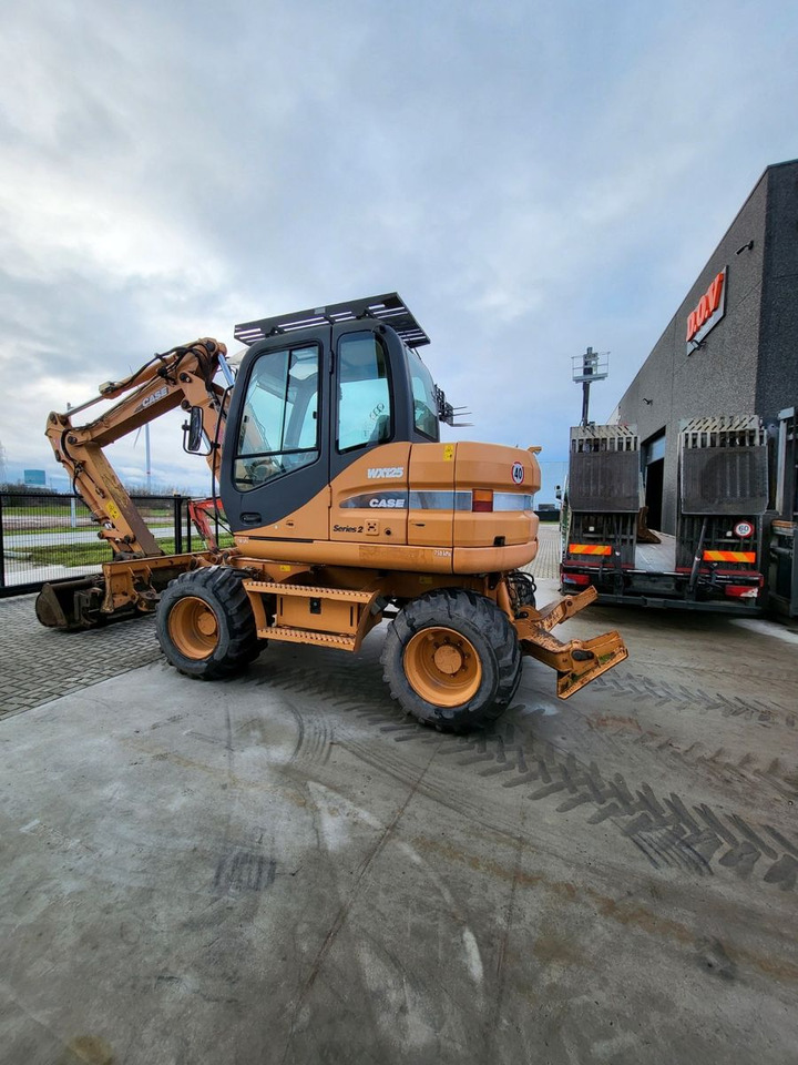 Case WX125 - Bager na kotačima: slika  Case WX125 - Bager na kotačima Case WX125 - Bager na kotačima: slika  Case WX125 - Bager na kotačima