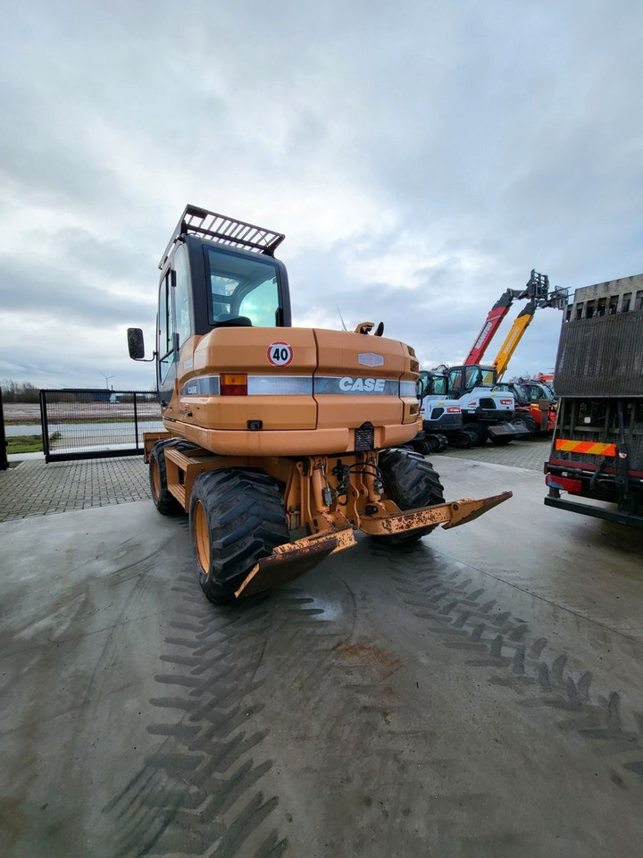 Case WX125 - Bager na kotačima: slika  Case WX125 - Bager na kotačima Case WX125 - Bager na kotačima: slika  Case WX125 - Bager na kotačima