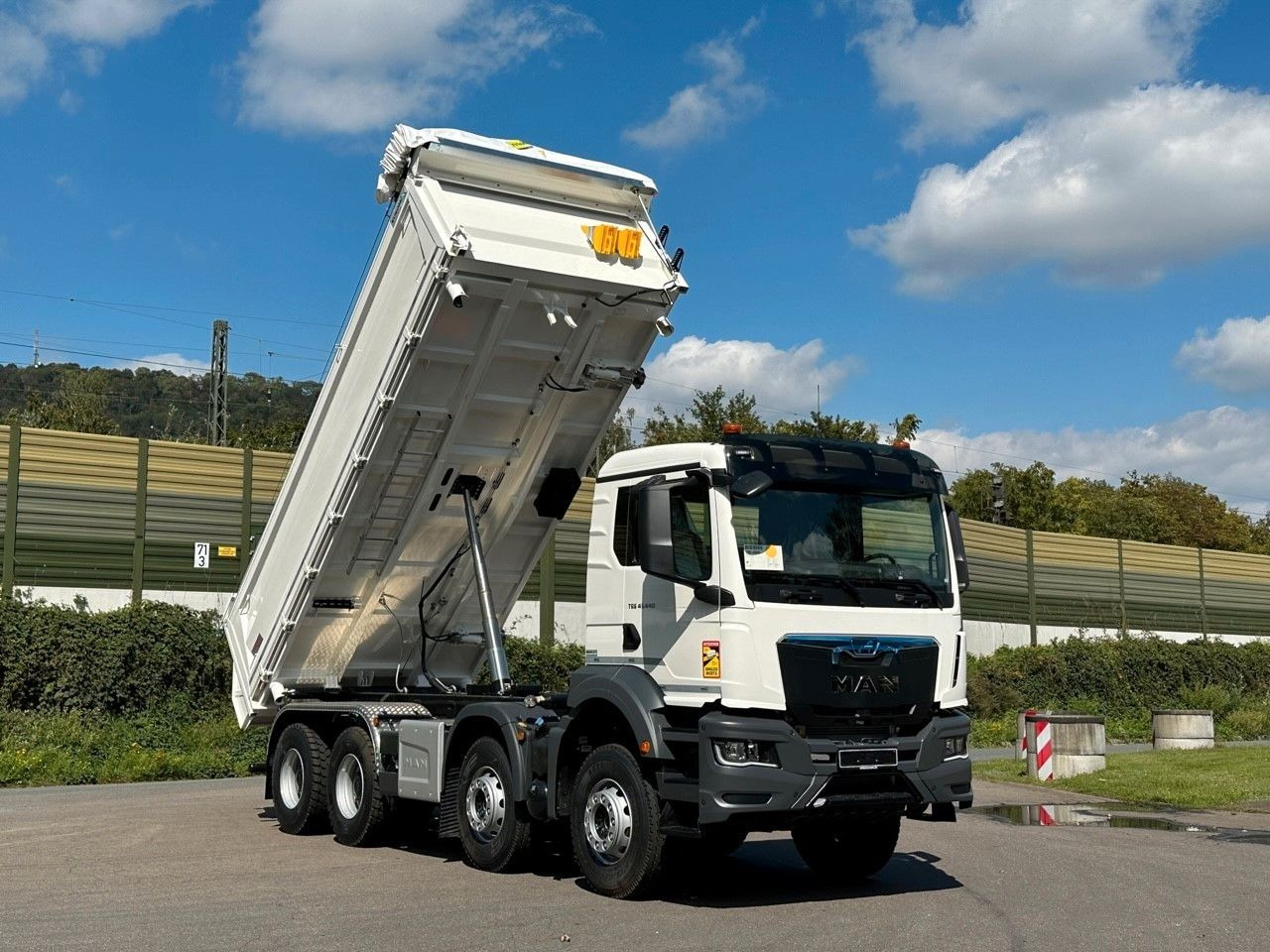 Kiper MAN TGS 41.440  8x4 EuromixMTP 3-Seiten-Kipper: slika Kiper MAN TGS 41.440  8x4 EuromixMTP 3-Seiten-Kipper