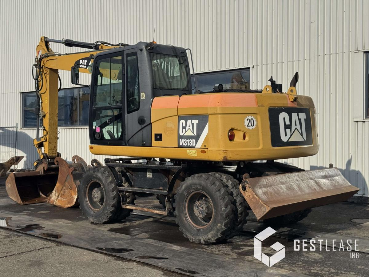 Caterpillar M313D - Bager na kotačima: slika Caterpillar M313D - Bager na kotačima Caterpillar M313D - Bager na kotačima: slika Caterpillar M313D - Bager na kotačima