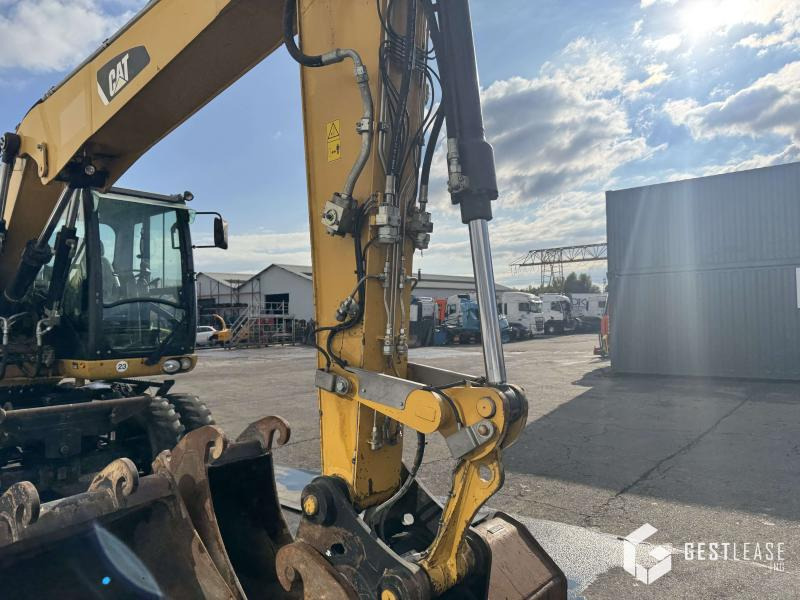 Caterpillar M313D - Bager na kotačima: slika Caterpillar M313D - Bager na kotačima Caterpillar M313D - Bager na kotačima: slika Caterpillar M313D - Bager na kotačima