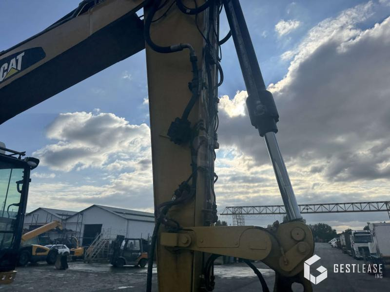 Caterpillar M315F - Bager na kotačima: slika Caterpillar M315F - Bager na kotačima Caterpillar M315F - Bager na kotačima: slika Caterpillar M315F - Bager na kotačima