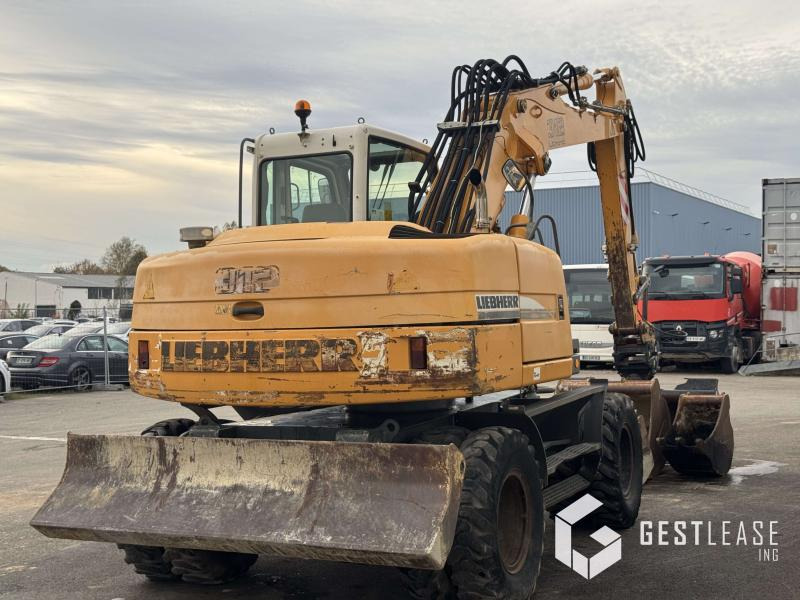 Liebherr A312 Litronic - Bager na kotačima: slika Liebherr A312 Litronic - Bager na kotačima Liebherr A312 Litronic - Bager na kotačima: slika Liebherr A312 Litronic - Bager na kotačima