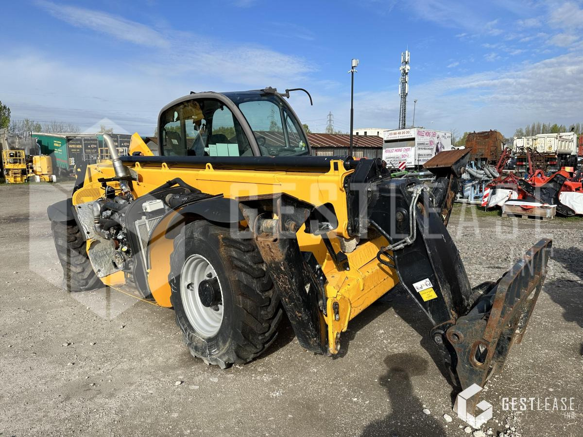 Manitou MT1440 - Regalni viličar: slika Manitou MT1440 - Regalni viličar Manitou MT1440 - Regalni viličar: slika Manitou MT1440 - Regalni viličar