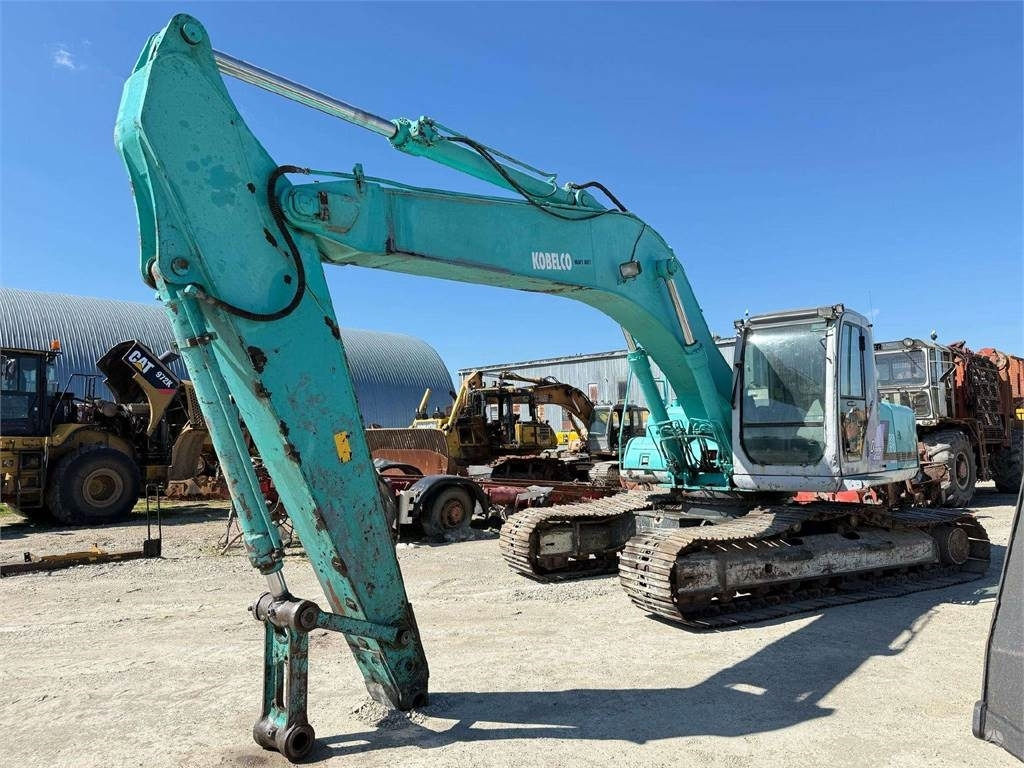 Kobelco SK 250 NLC-6 - Bager gusjeničar: slika Kobelco SK 250 NLC-6 - Bager gusjeničar Kobelco SK 250 NLC-6 - Bager gusjeničar: slika Kobelco SK 250 NLC-6 - Bager gusjeničar