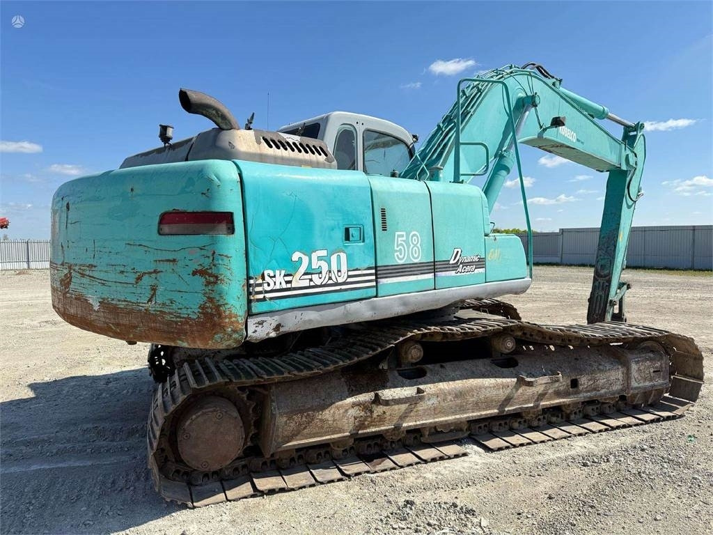 Kobelco SK 250 NLC-6 - Bager gusjeničar: slika Kobelco SK 250 NLC-6 - Bager gusjeničar Kobelco SK 250 NLC-6 - Bager gusjeničar: slika Kobelco SK 250 NLC-6 - Bager gusjeničar
