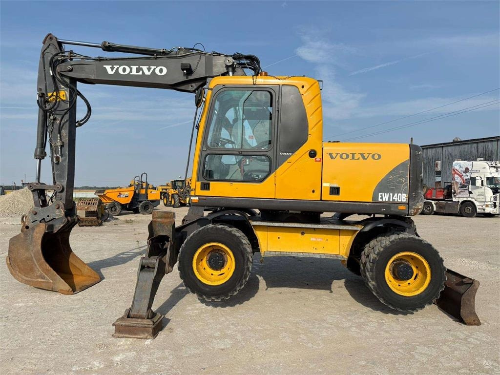 Volvo EW 140 B - Bager na kotačima: slika Volvo EW 140 B - Bager na kotačima Volvo EW 140 B - Bager na kotačima: slika Volvo EW 140 B - Bager na kotačima