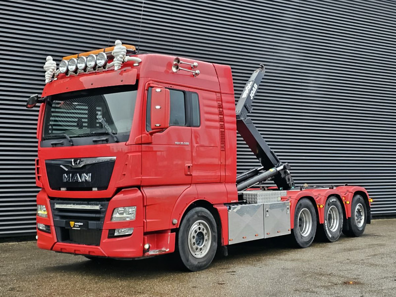 MAN TGX 35.500 / 8x4-4 / HOOKLIFT / ABROLL-KIPPER - Kamion s kukastom dizalicom: slika MAN TGX 35.500 / 8x4-4 / HOOKLIFT / ABROLL-KIPPER - Kamion s kukastom dizalicom MAN TGX 35.500 / 8x4-4 / HOOKLIFT / ABROLL-KIPPER - Kamion s kukastom dizalicom: slika MAN TGX 35.500 / 8x4-4 / HOOKLIFT / ABROLL-KIPPER - Kamion s kukastom dizalicom