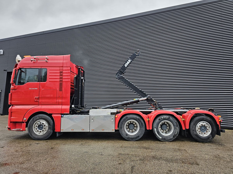 MAN TGX 35.500 / 8x4-4 / HOOKLIFT / ABROLL-KIPPER - Kamion s kukastom dizalicom: slika MAN TGX 35.500 / 8x4-4 / HOOKLIFT / ABROLL-KIPPER - Kamion s kukastom dizalicom MAN TGX 35.500 / 8x4-4 / HOOKLIFT / ABROLL-KIPPER - Kamion s kukastom dizalicom: slika MAN TGX 35.500 / 8x4-4 / HOOKLIFT / ABROLL-KIPPER - Kamion s kukastom dizalicom