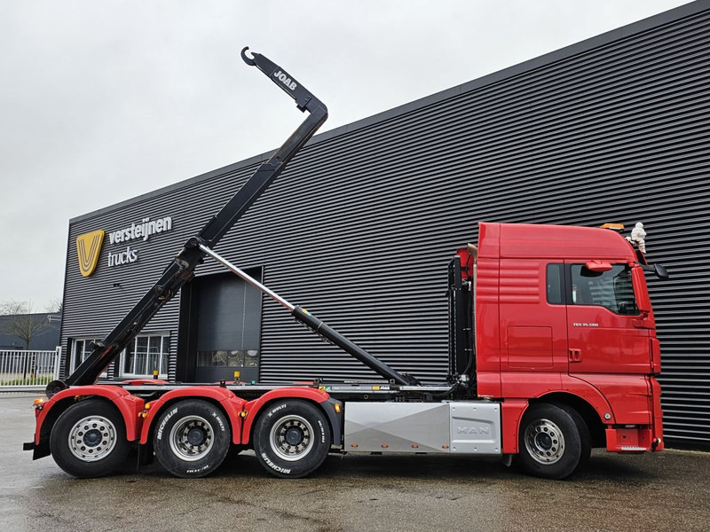 MAN TGX 35.500 / 8x4-4 / HOOKLIFT / ABROLL-KIPPER - Kamion s kukastom dizalicom: slika MAN TGX 35.500 / 8x4-4 / HOOKLIFT / ABROLL-KIPPER - Kamion s kukastom dizalicom MAN TGX 35.500 / 8x4-4 / HOOKLIFT / ABROLL-KIPPER - Kamion s kukastom dizalicom: slika MAN TGX 35.500 / 8x4-4 / HOOKLIFT / ABROLL-KIPPER - Kamion s kukastom dizalicom