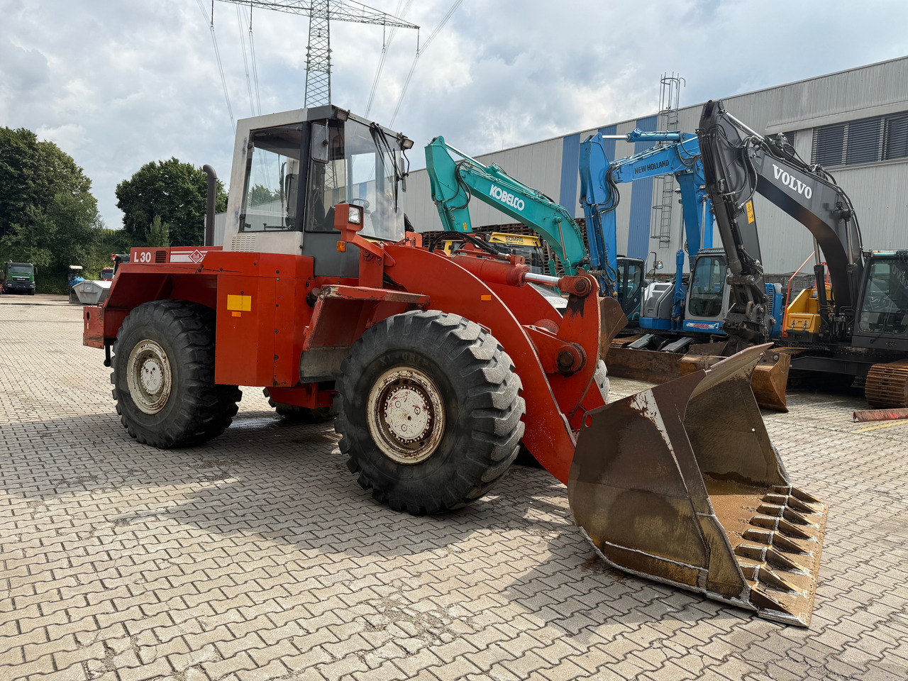 O&K L30 Radlader Waage Zentralschmierung - Utovarivač na kotačima: slika O&K L30 Radlader Waage Zentralschmierung - Utovarivač na kotačima O&K L30 Radlader Waage Zentralschmierung - Utovarivač na kotačima: slika O&K L30 Radlader Waage Zentralschmierung - Utovarivač na kotačima
