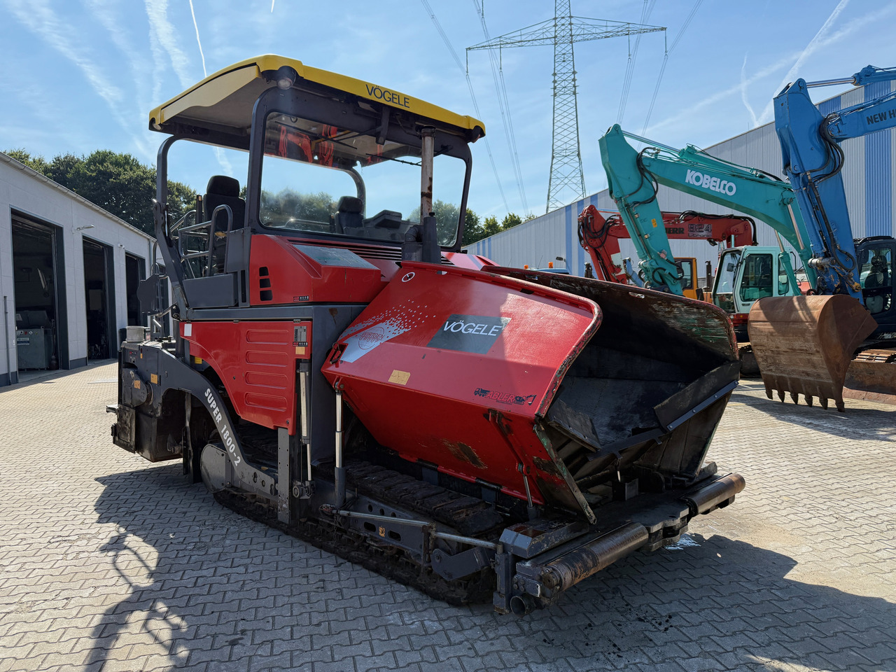 Vögele Super 1800-2 Asphaltfertiger mit Nivellierung 650cm - Finišer za asfalt: slika Vögele Super 1800-2 Asphaltfertiger mit Nivellierung 650cm - Finišer za asfalt Vögele Super 1800-2 Asphaltfertiger mit Nivellierung 650cm - Finišer za asfalt: slika Vögele Super 1800-2 Asphaltfertiger mit Nivellierung 650cm - Finišer za asfalt
