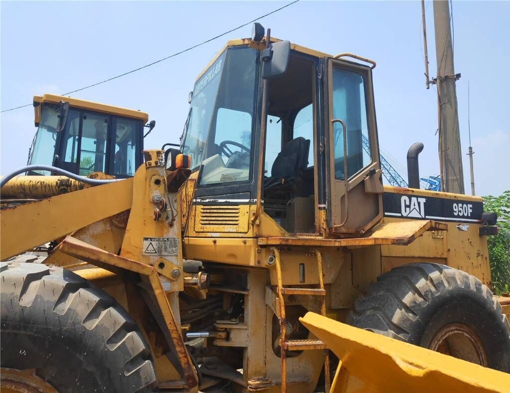 Caterpillar 950 F - Utovarivač na kotačima: slika Caterpillar 950 F - Utovarivač na kotačima Caterpillar 950 F - Utovarivač na kotačima: slika Caterpillar 950 F - Utovarivač na kotačima
