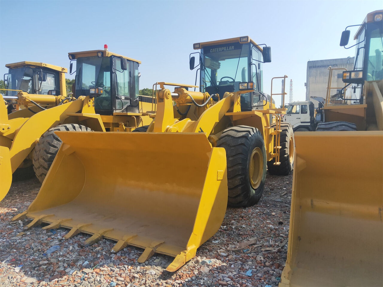 Caterpillar 950H - Utovarivač na kotačima: slika Caterpillar 950H - Utovarivač na kotačima Caterpillar 950H - Utovarivač na kotačima: slika Caterpillar 950H - Utovarivač na kotačima