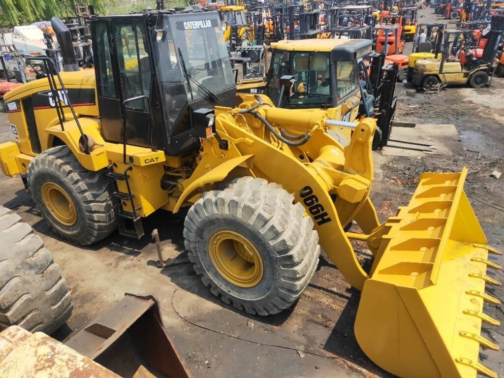 Caterpillar 966 H - Utovarivač na kotačima: slika Caterpillar 966 H - Utovarivač na kotačima Caterpillar 966 H - Utovarivač na kotačima: slika Caterpillar 966 H - Utovarivač na kotačima