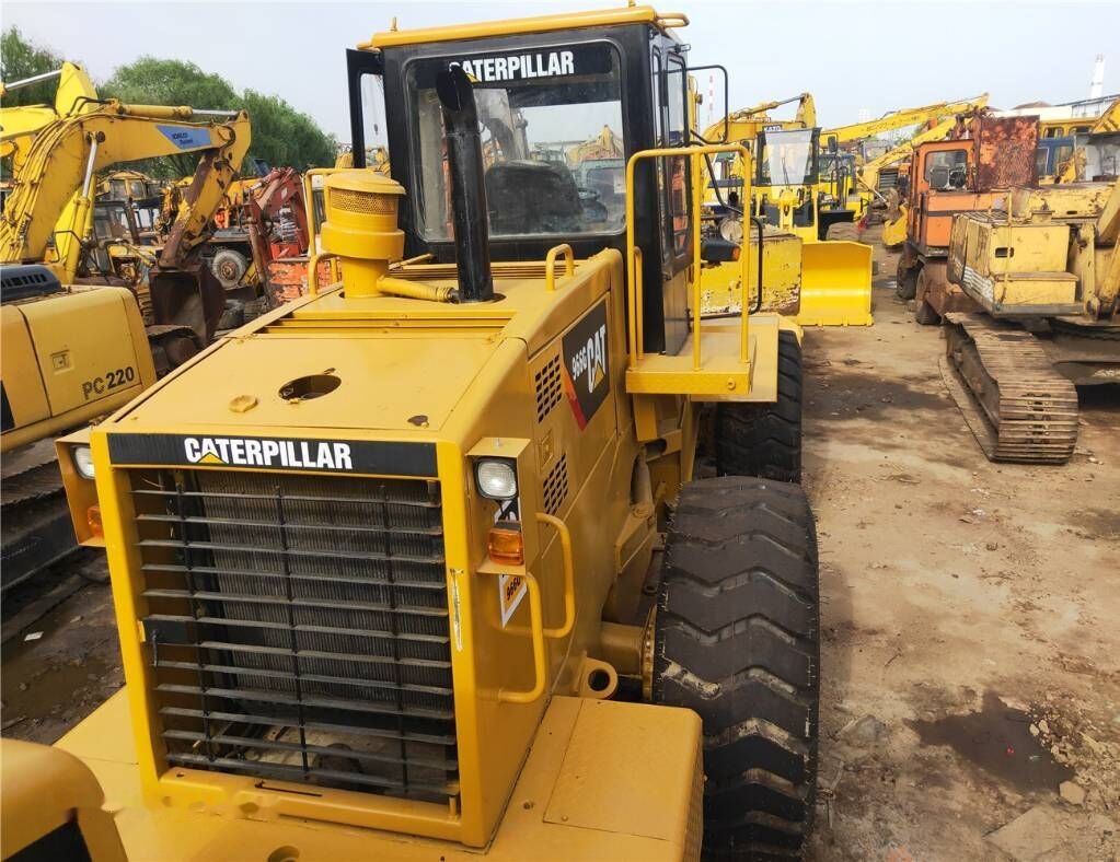 Caterpillar 966G - Utovarivač na kotačima: slika Caterpillar 966G - Utovarivač na kotačima Caterpillar 966G - Utovarivač na kotačima: slika Caterpillar 966G - Utovarivač na kotačima